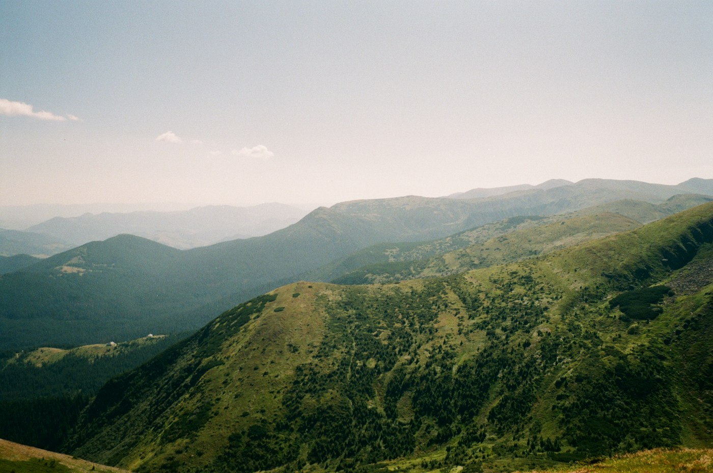 Green mountain ridges in an example photography website